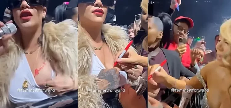 Mariah Carey firma un autógrafo en el pecho de Rihanna durante un concierto de Navidad Mariah Carey firma un autógrafo en el pecho de Rihanna durante un concierto de Navidad